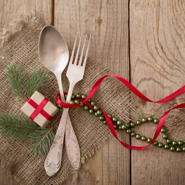 istock Christmas table place setting on wooden background 1178558015