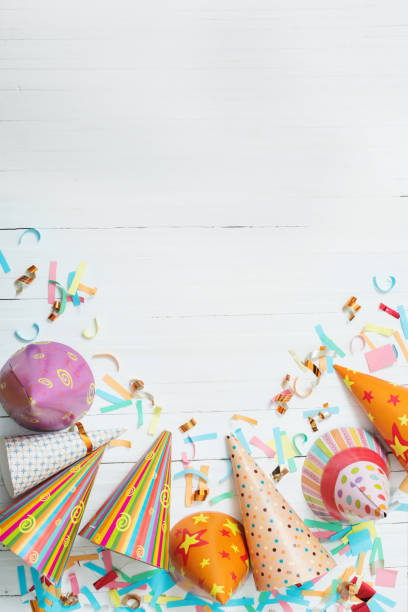istock birthday decoration on white wooden background 1178558025