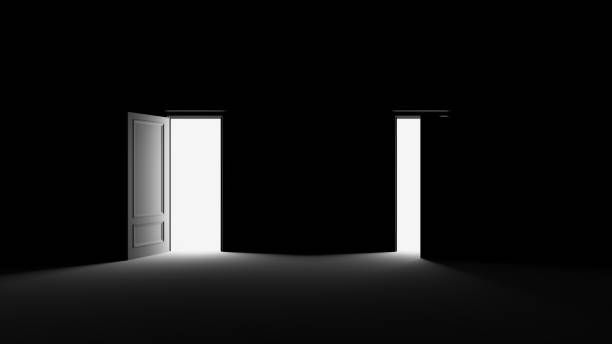 istock Bright white light illuminating a black room through a door.3d render 1178560930
