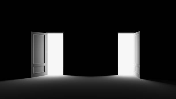 istock Bright white light illuminating a black room through a door.3d render 1178560944