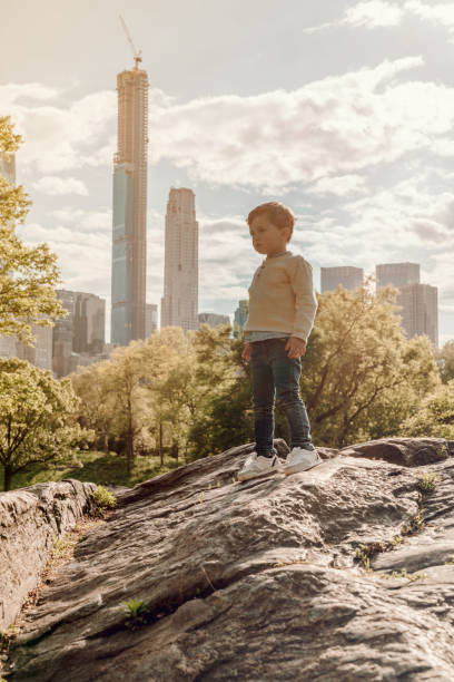 istock Boys playing at Central Park, New York 1178561093
