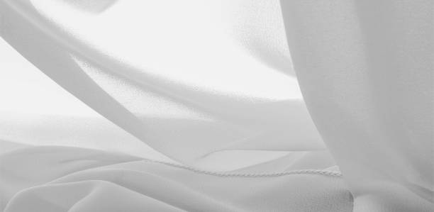 istock texture background pattern. White silk fabric with a subtle matte sheen. It is perfect for your design, accents, wallpapers, posters and postcards. 1178562410