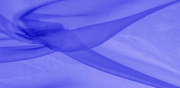 Texture of blue silk fabric. It is also perfect for your design, clothes, posters. Be creative with beautiful project accents. This fabric is inspired by your inspiration.
