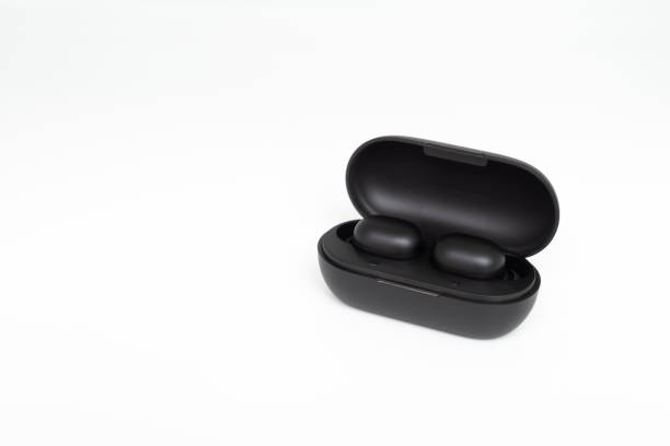 istock Black true wireless earbuds with power bank case on the white isolated background 1178563014