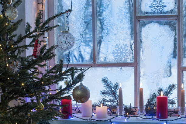 istock Christmas decorations on old wooden window 1178564631