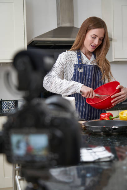 Female Vlogger Making Social Media Video About Cooking For The Internet