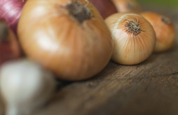 istock Fresh , organic onions in basket on old wooden table. Selective focus 1178566993