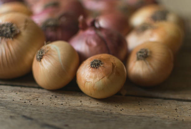 istock Fresh , organic onions in basket on old wooden table. Selective focus 1178567104