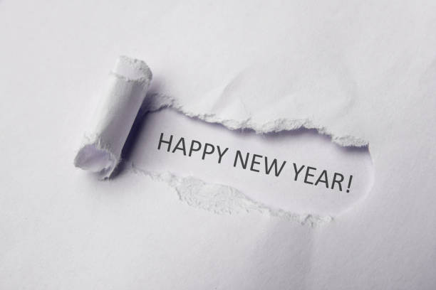 istock Happy new year on white Torn Paper. Copy space 1178567157