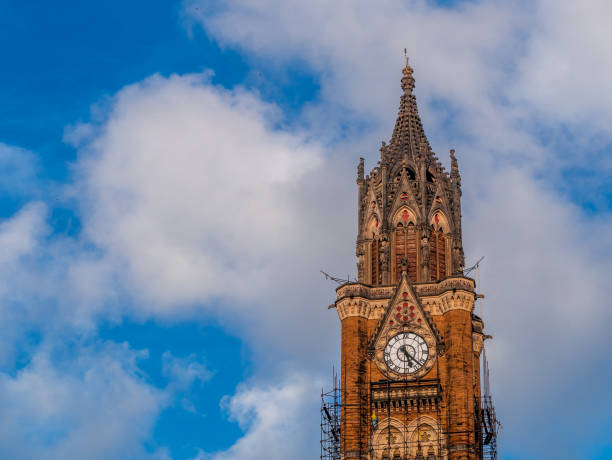 Chhatrapati Shivaji Maharaj Terminus (CSMT), formerly Victoria Terminus in details. Sunset time - bright colors. Historic railway station and a UNESCO World Heritage Site.