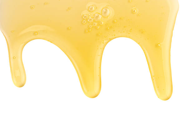 istock Texture of honey drips patterns isolated on white background 1178571832