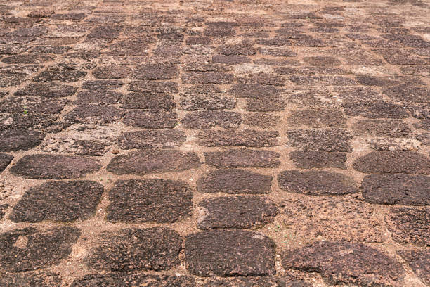 The old Laterite are paved as a walk way at Sdok Kok Thom Temple, Thailand