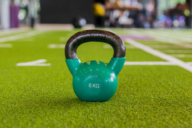 istock Kettlebell on artificial grass in the gym. 1178573109