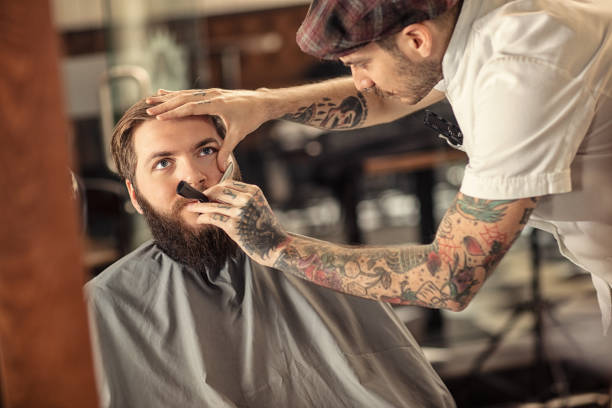 istock Barber man grooming with scissors of real hipster 1178573699