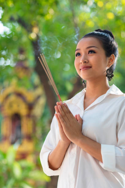 istock Woman visiting a temple garden 1178576181