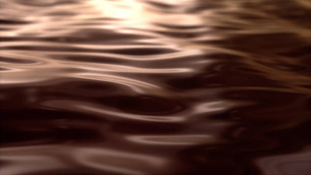 istock The surface of liquid chocolate. Melted milk chocolate in motion. 3d illustration 1178576248