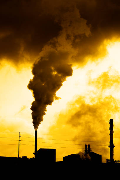 istock Pollution from smoke stack at a factory production bad for the environment 1178577896