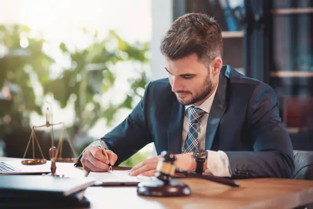 Photo of Lawyer or attorney working in the office