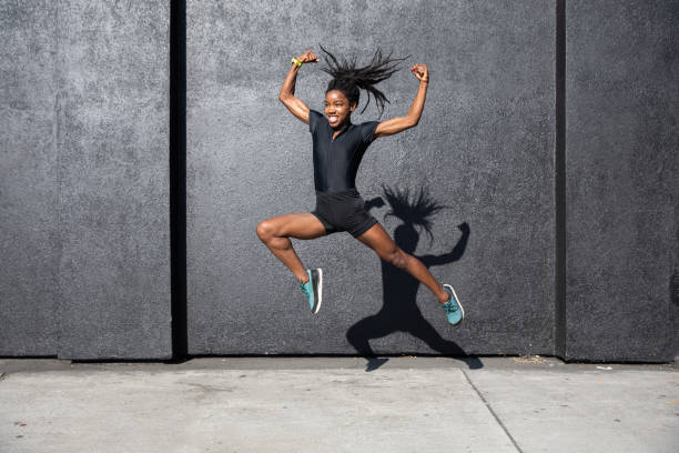 istock Afro american woman with dreadlocks in a great athletic shape working out and training hard outdoors 1178579446