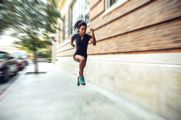 istock Afro american woman with dreadlocks in a great athletic shape working out and training hard outdoors 1178579738