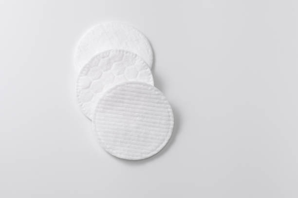 istock Cotton pads for removing cosmetics on a gray plain background 1178580603