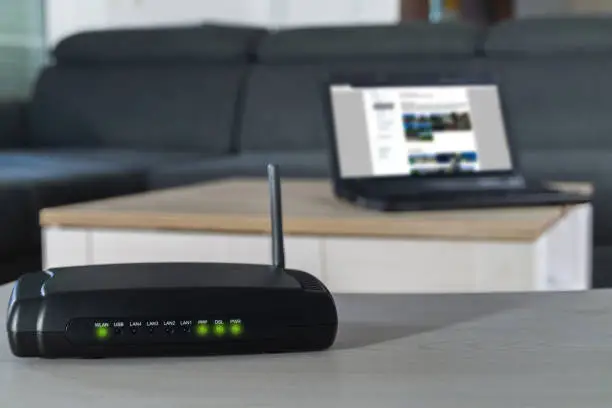 Photo of Home internet router on desk.