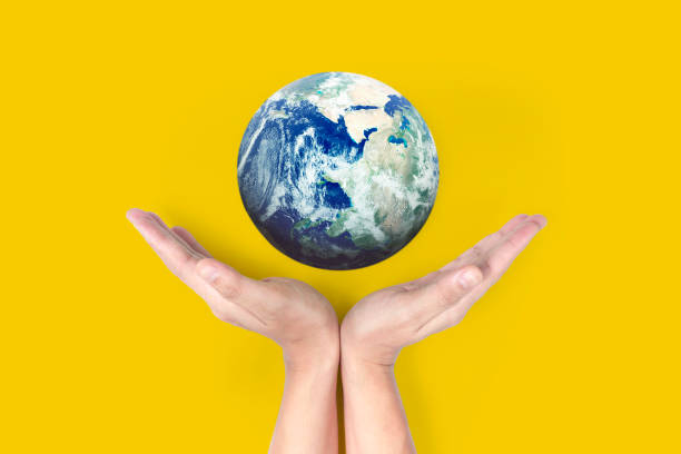 istock Globe ,earth in  hand, holding our planet glowing. Earth image provided by Nasa 1178582004