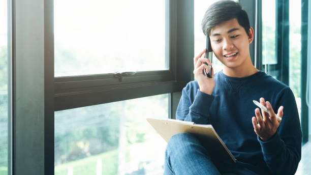 istock Young startup business professional talking to a client on his cellphone. 1178585453