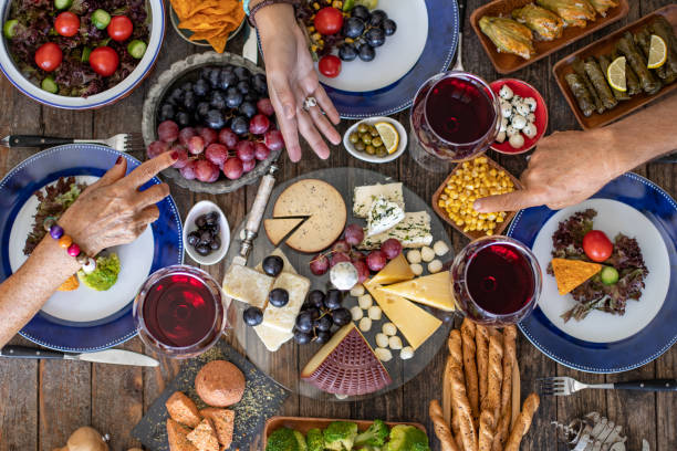 istock Family dinner for a celebration with red wine and cheers. 1178586798