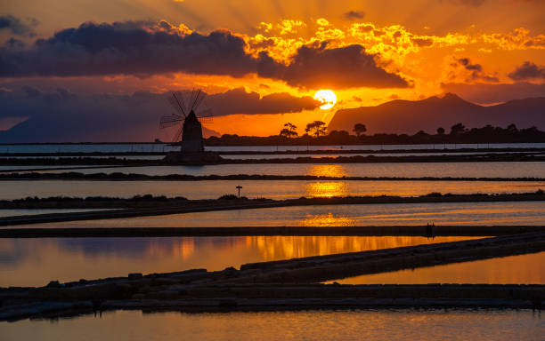 istock Marsala salt pans at sunset, Sicily, Italy 1178589796