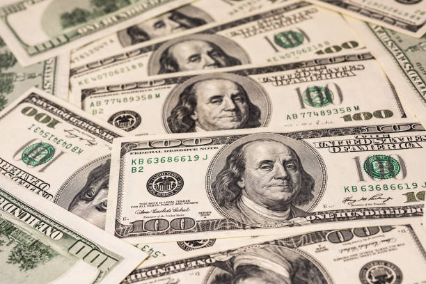 istock Background of one hundred dollar bills 1178589855