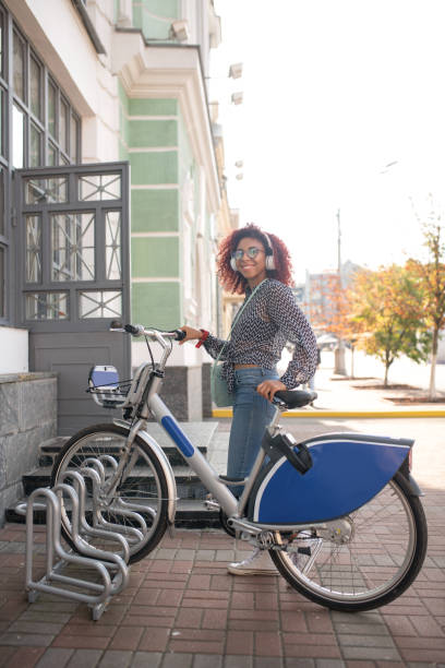 istock Beaming student leaving her bike before entering university 1178592745