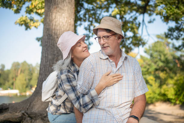 istock Loving wife wearing hat hugging her handsome caring man 1178592968