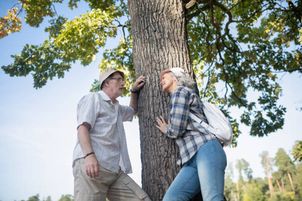 istock Wife wearing white backpack talking to husband 1178592984