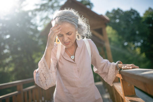 istock Woman wearing nice earrings having strong headache 1178593150