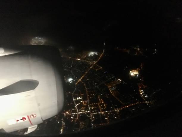 istock Flying over a city at night 1178593184