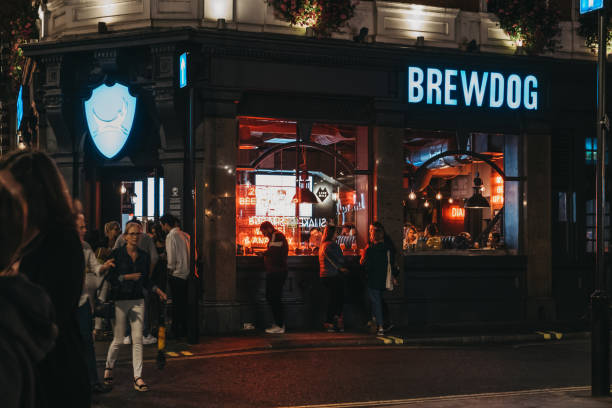 People standing outside Brewdog pub in Covent Garden, London, UK. stock photo