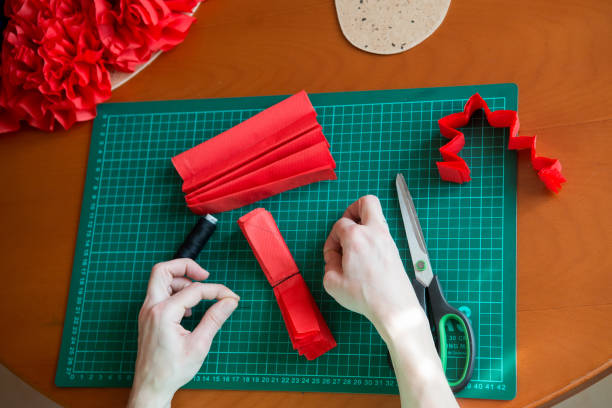 istock Handmade art from tissue paper. DIY paper pompon. 1178599606