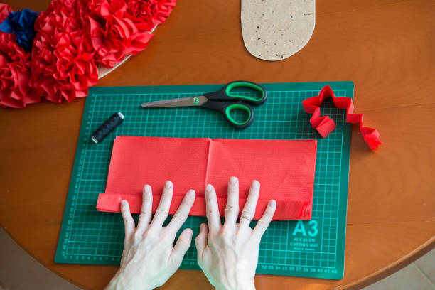istock Handmade art from tissue paper. DIY paper pompon. 1178601067