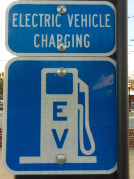 istock 100% electric vehicle charging station 1178601110