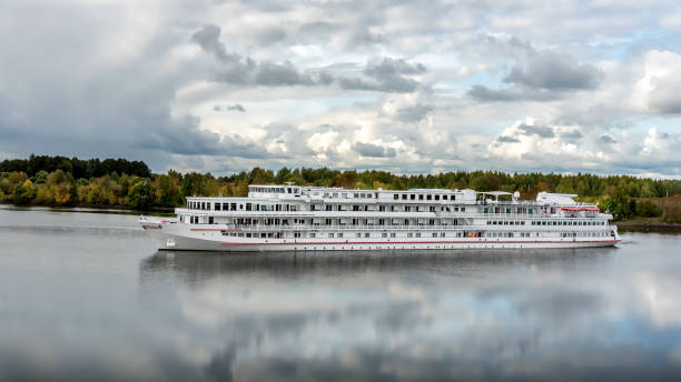 istock Cruise ship on the river at sunset 1178602102