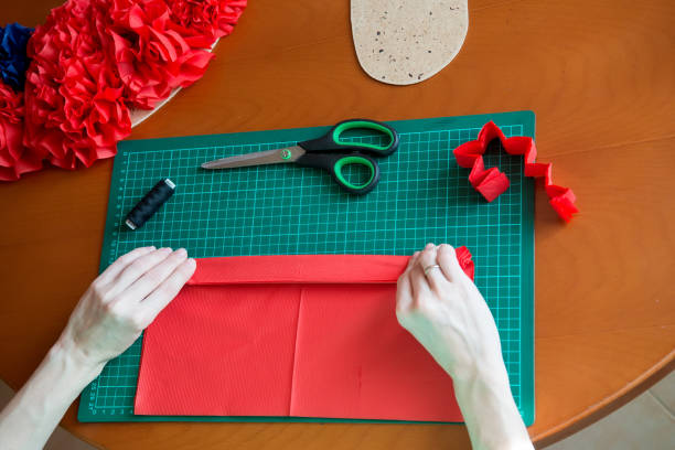 istock Handmade art from tissue paper. DIY paper pompon. 1178602257