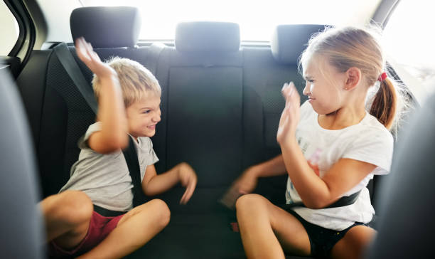 istock Kids fighting in the car 1178602293