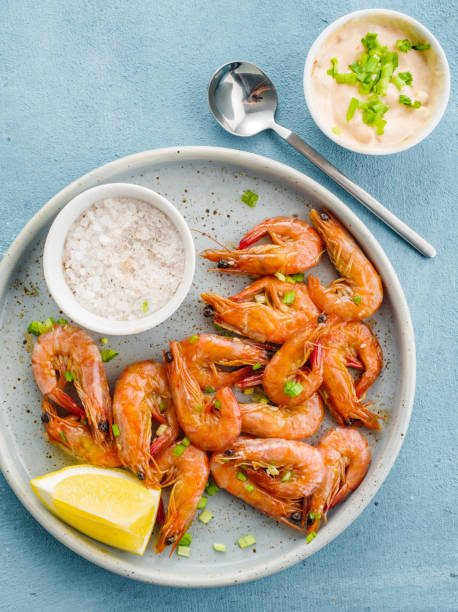 istock Shrimp glazed in soy sauce with green onion and lemon. 1178603902