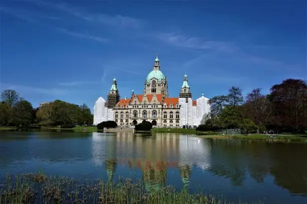 New Town Hall in Hanover, Germany with Maschpark and lake