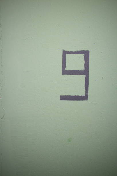 istock green concrete wall in building with number 9 1178609379