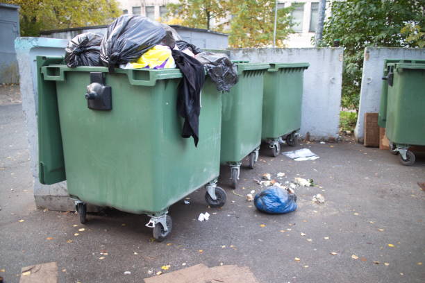 istock household waste, garbage cans in the city block 1178609425