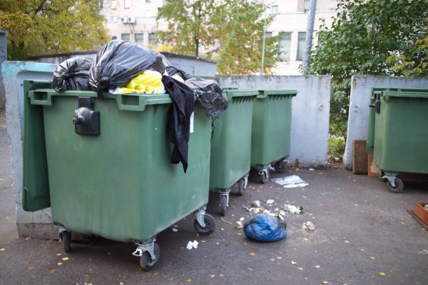 istock household waste, garbage cans in the city block 1178609585