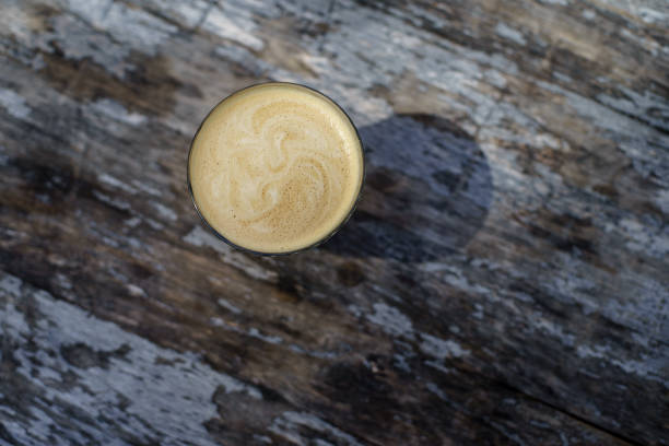 istock Coffee Latte on wooden table, top view 1178609784