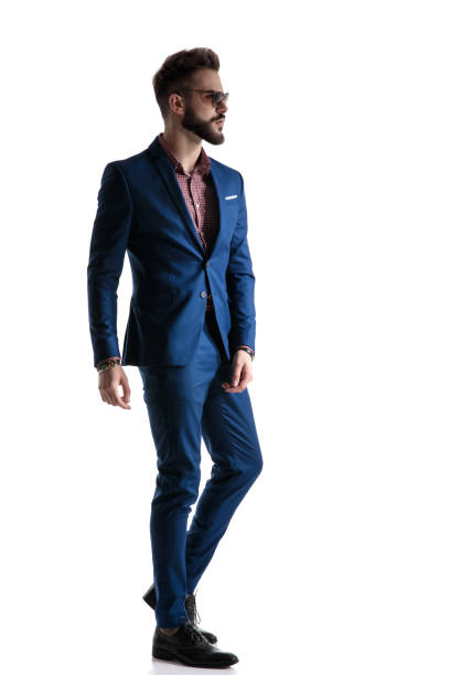 istock formal businessman standing on one tip and looking ahead pensive 1178610535